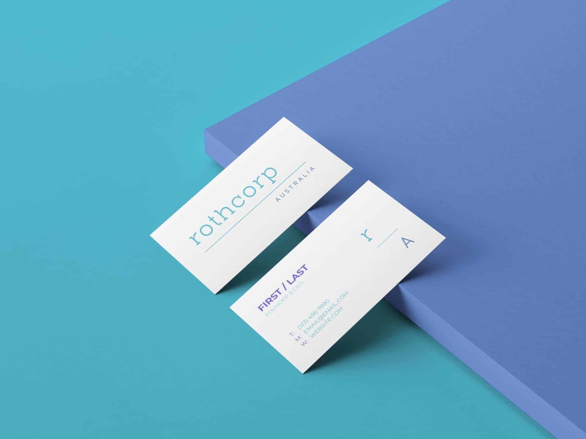 Two business cards on a blue surface with Brand Design in Australia.
