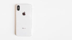 A brand new iPhone XR showcased on a sleek white surface, representing the latest in Apple's design and innovation.